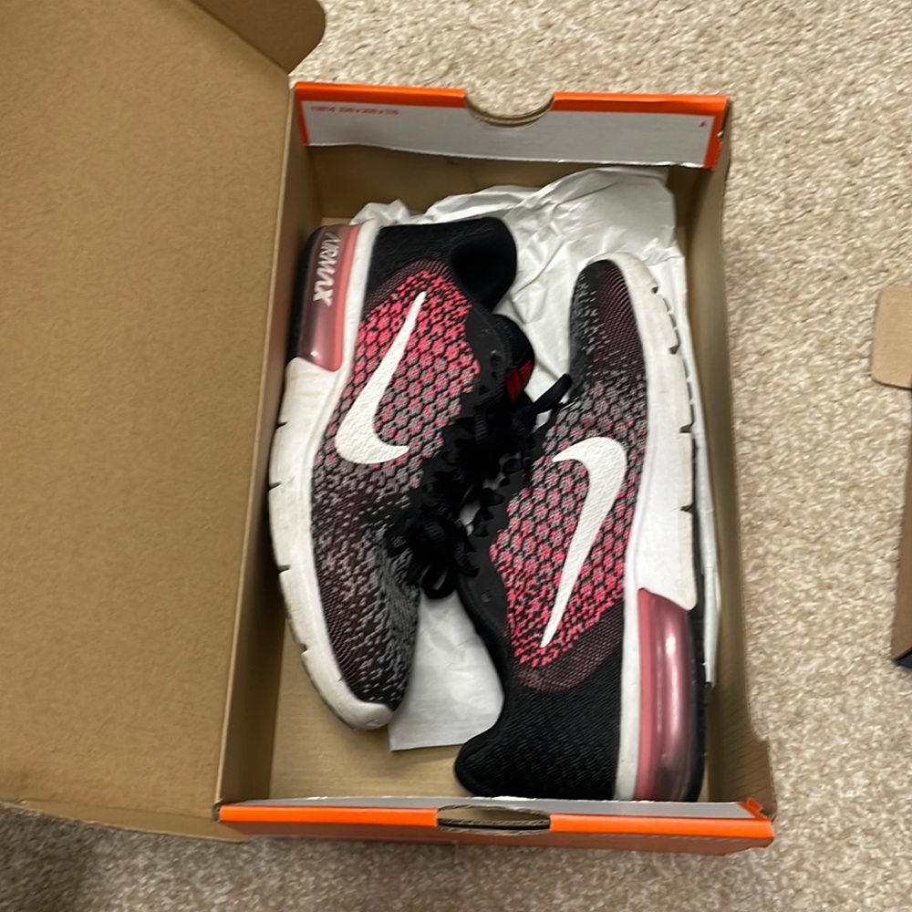 Black and pink Nike air max